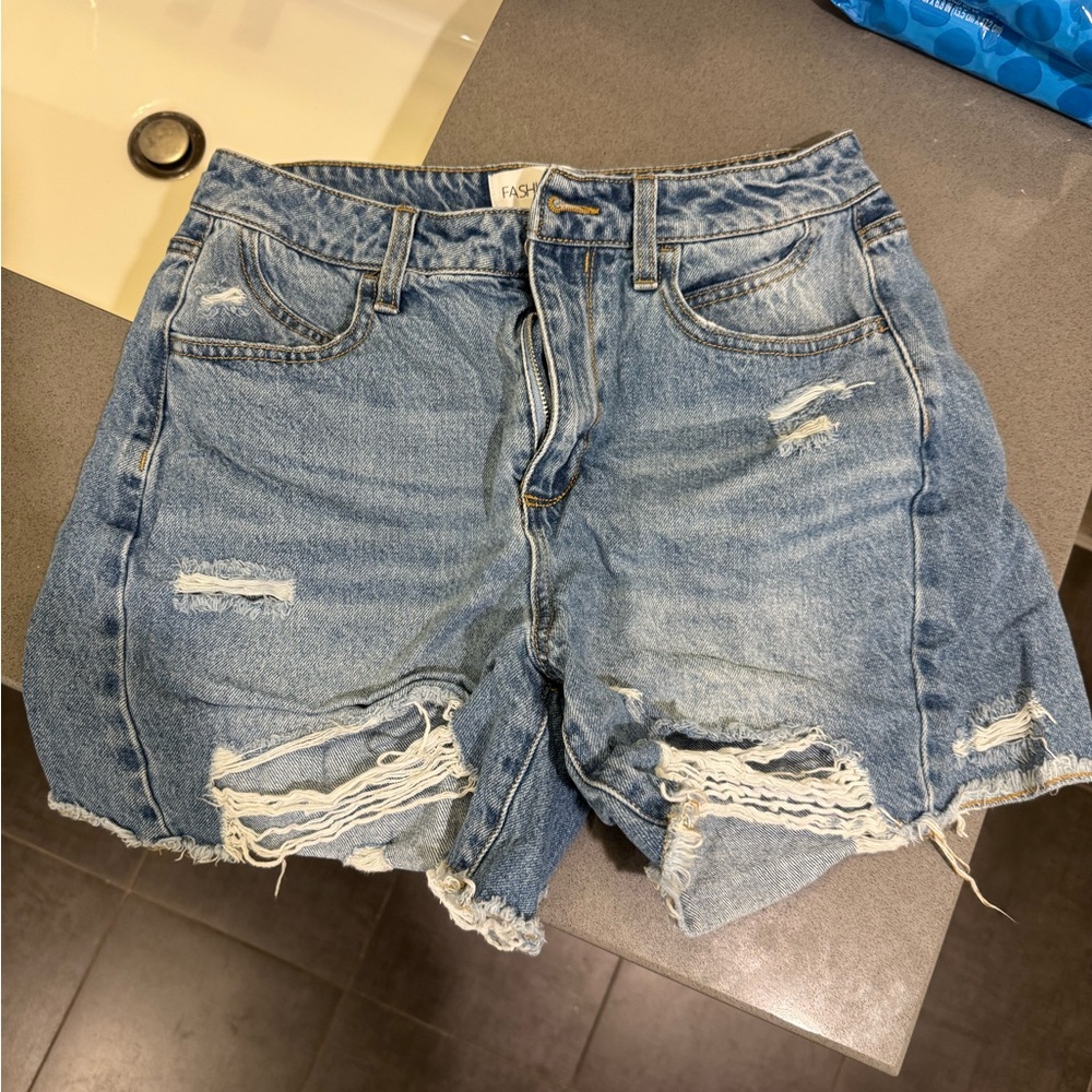 Fashion Nova Light Blue Ripped Jean Shorts